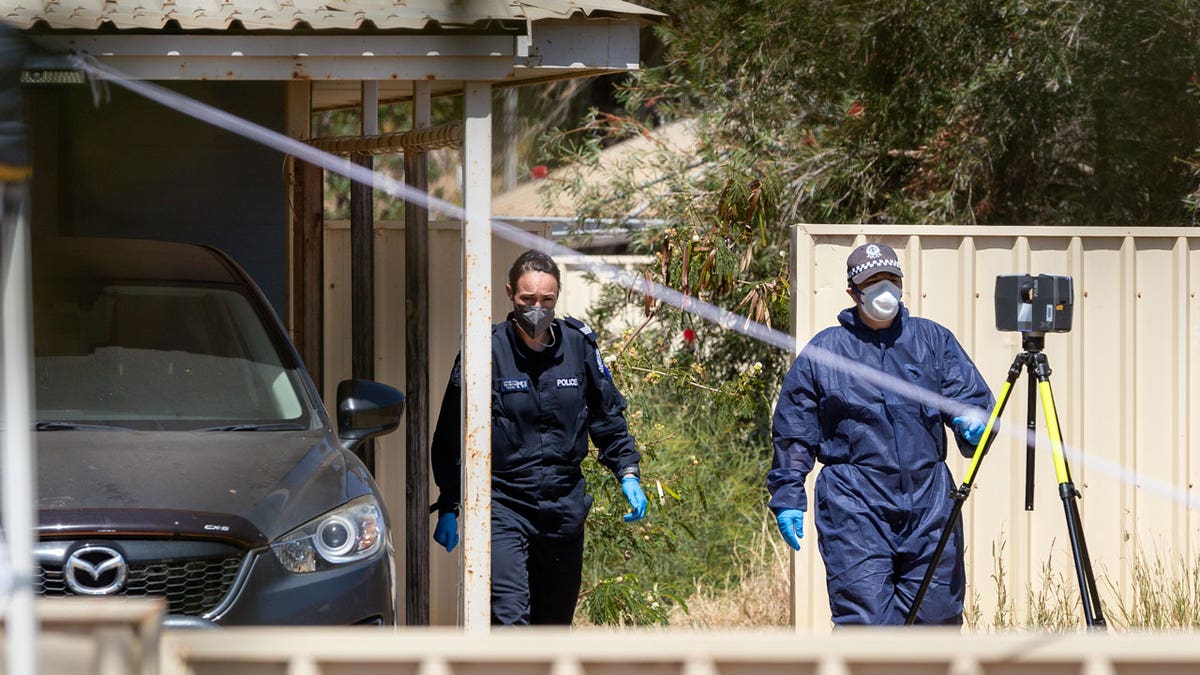Police investigate at a house, Thursday, Nov. 4, 2021, where 4-year-old Cleo Smith was rescued in Carnarvon, Australia. 