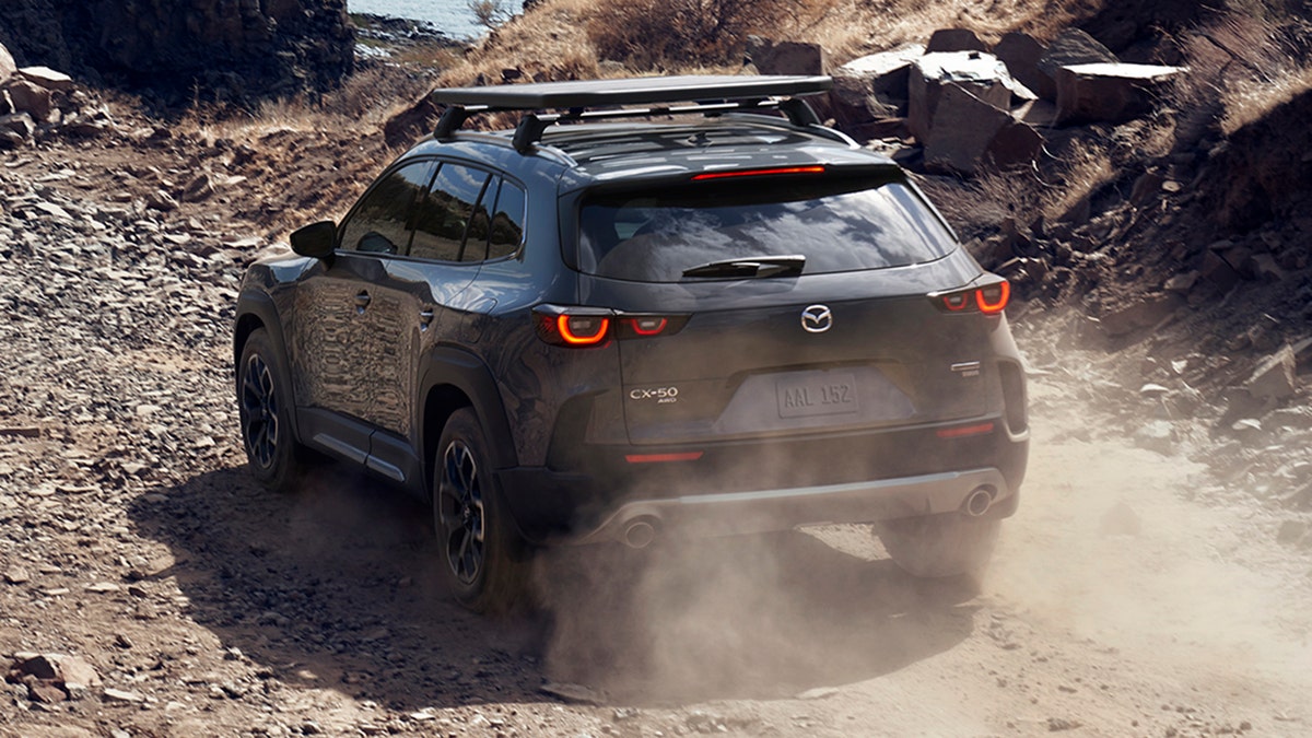 The Mazda CX-50 features body cladding and a raised ride height.