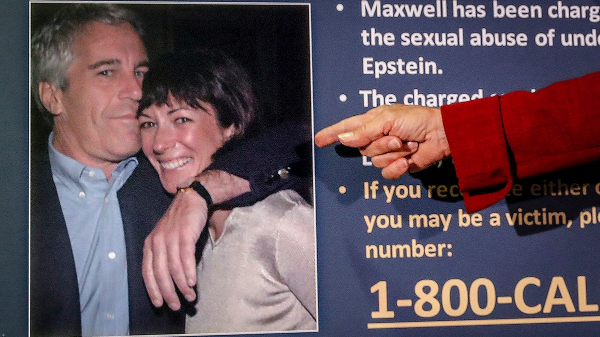 Audrey Strauss, acting U.S. attorney for the Southern District of New York, points to a photo of Jeffrey Epstein and Ghislaine Maxwell during a news conference in New York, July 2, 2020. 