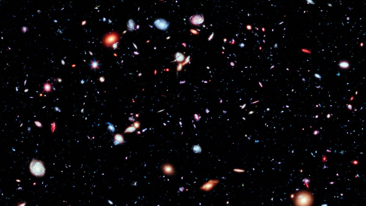 This image made available by the European Space Agency shows thousands of galaxies captured by the Hubble Space Telescope in observations from 2002-2009.