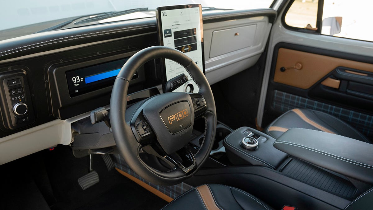 The interior is equipped with digital displays from the Mach-E.