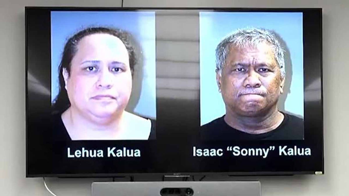 Photos of Isaac and Lehua Kalua shown on a TV screen during a press conference by Honolulu police and FBI Wednesday announcing their arrests on murder charges. 