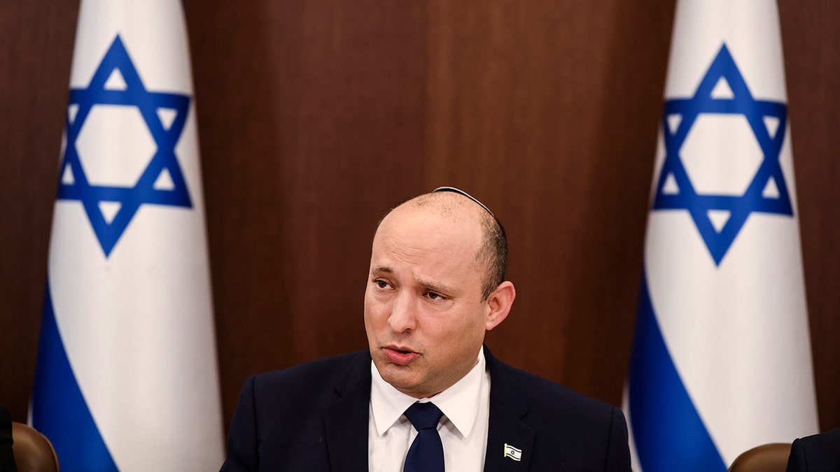 In this Oct. 5, 2021 file photo, Israeli Prime Minister Naftali Bennett speaks at the weekly cabinet meeting in Jerusalem. Iran and world powers resume talks in Vienna this week of Nov. 28,  aimed at restoring the nuclear deal that crumbled after the U.S. pulled out three years ago. There are major doubts over whether the deal can be reinstated after years of mounting distrust. 