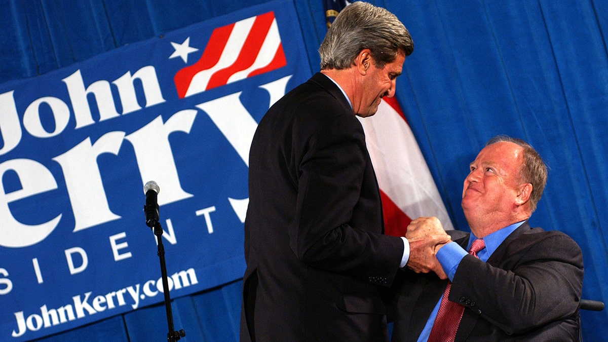 Sen. John Kerry and Former Georgia Sen. Max Cleland.