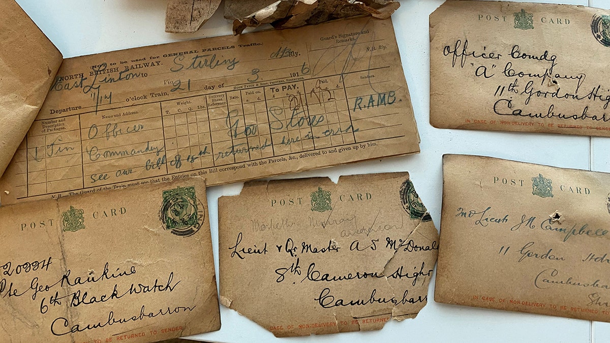 Postcards from 1916 that were sent to soldiers fighting in World War I were recently discovered in roof of the train station in the Scottish village of Cambusbarron while it was being renovated. (SWNS)