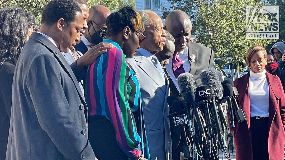 Rev. Al Sharpton, Ahmaud Arbery's family and civil rights attorney Ben Crump gather outside the Glynn County Courthouse