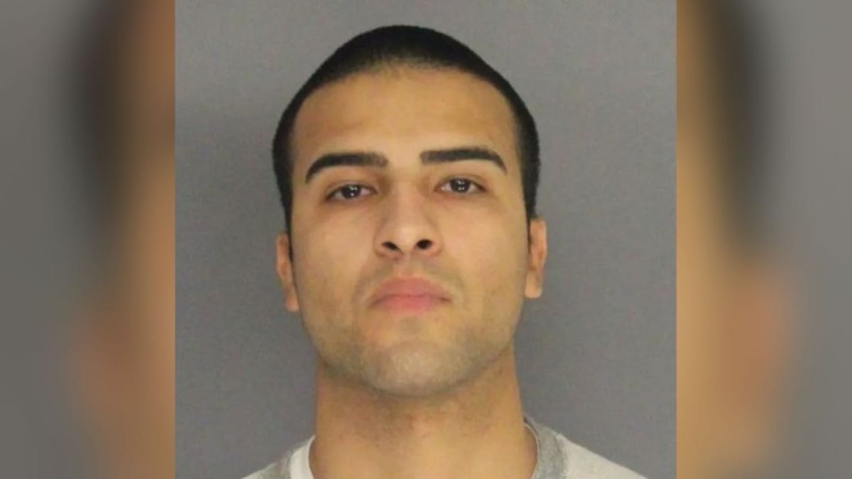 Newark, New Jersey, police Officer Louis Santiago is facing numerous charges after allegedly killing a man with his vehicle and then moving the body, authorities say. (Essex County Prosecutor's Office)
