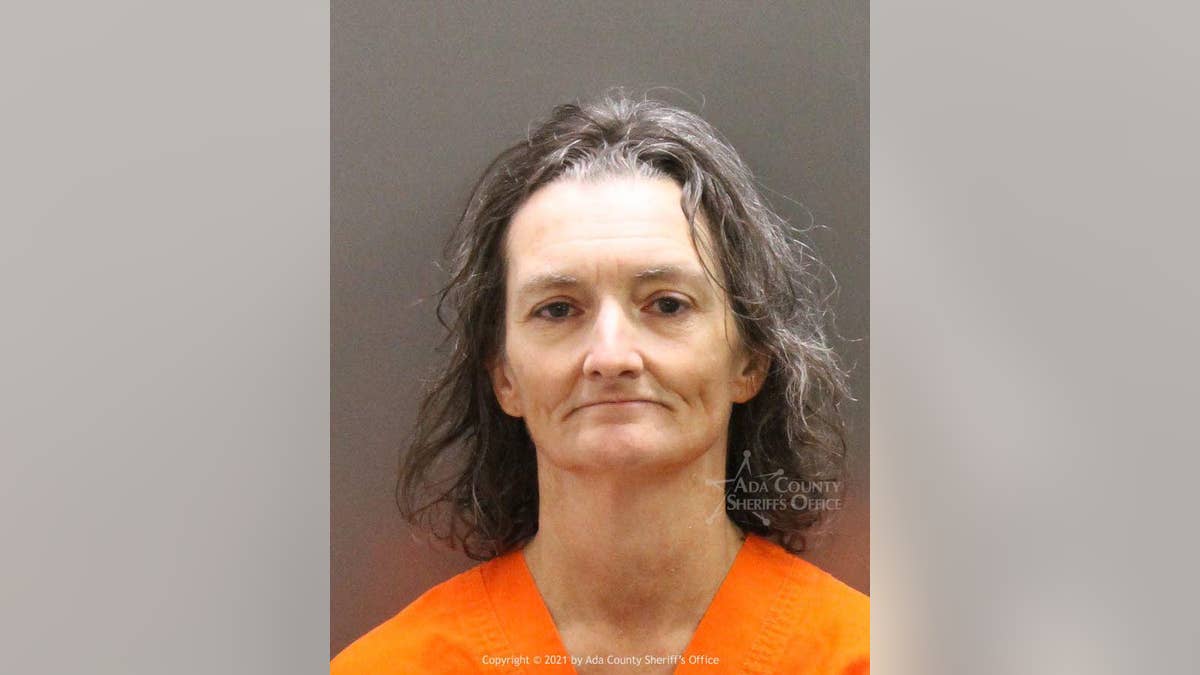 Mary Alyce Scarbrough, 54, allegedly stole from a dying security guard following a mall shooting in Boise last week.