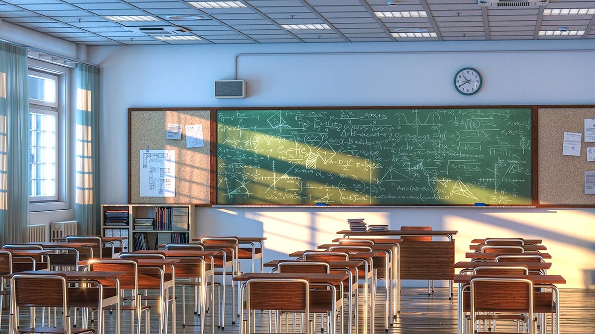 empty classroom with chalkboard