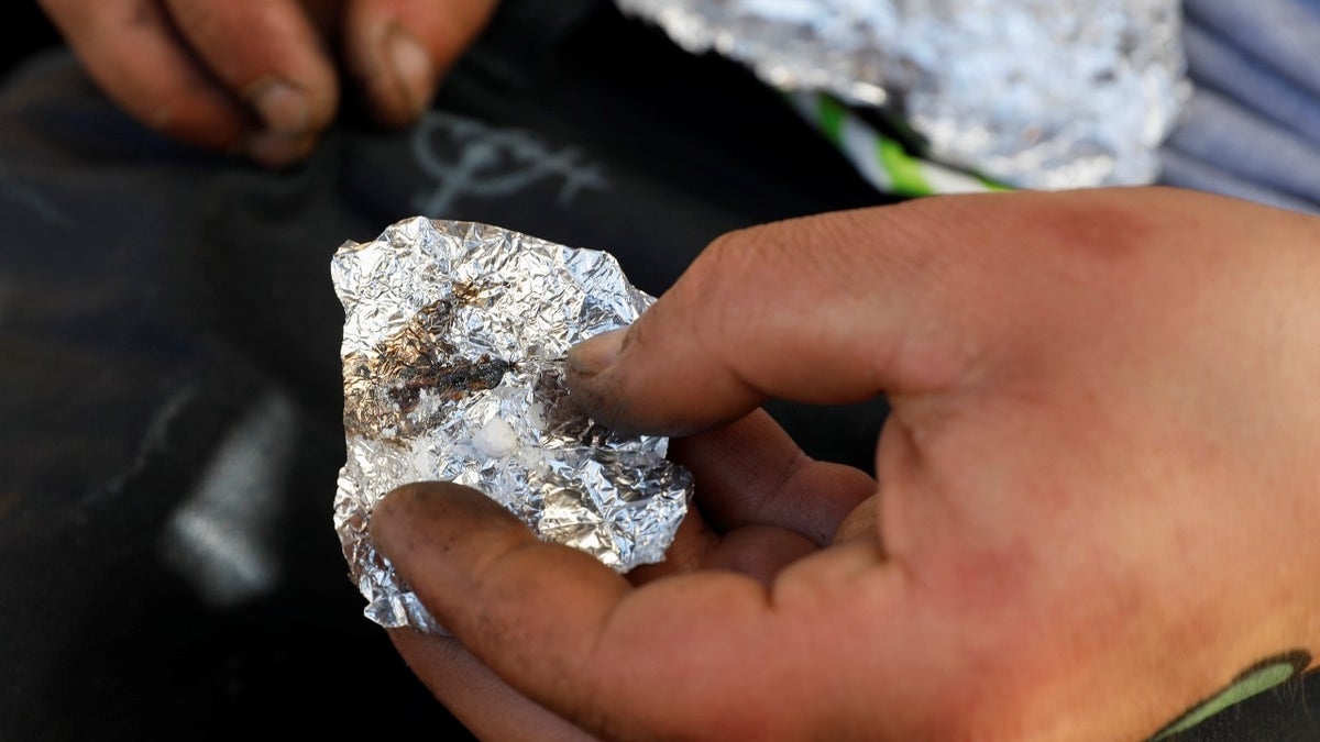 A man living on the streets displays what he says is the synthetic drug fentanyl. REUTERS/Shannon Stapleton