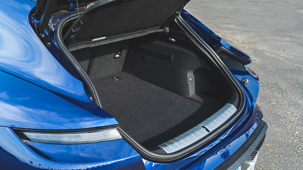 The long roofline and hatchback provide better cargo carrying capability than the sedan.