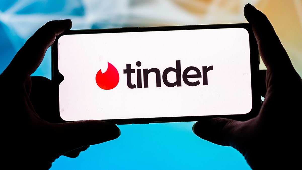 Tinder logo on phone