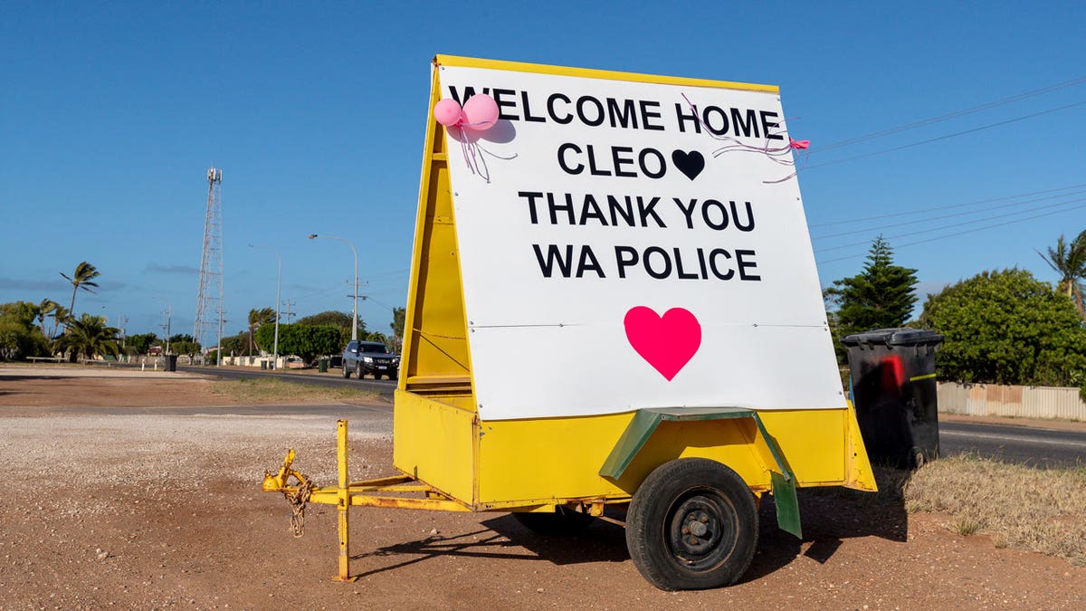 A sign, which reads, "Welcome Home Cleo, Thank You WA Police," is seen in support of missing girl Cleo Smith, who was rescued by Western Australian Police Wednesday morning in Carnarvon, 900 km (560 miles) north of the capital Perth in Western Australia, Thursday, Nov. 4, 2021.