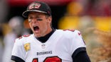 Tampa Bay Buccaneers quarterback Tom Brady yells at his team during the second half of an NFL football game against the Washington Football Team, Sunday, Nov. 14, 2021, in Landover, Md.