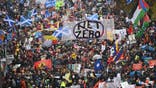 Protesters marched on Saturday in Glasgow, host of the COP26 U.N. climate summit.