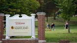 COLLEGE PARK, MD - OCTOBER 20:  Pedestrians walk across the Chapel Lawn at The University of Maryland College Park on Thursday October 20, 2016.  (Sarah L. Voisin/The Washington Post via Getty Images)