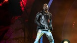Travis Scott performs at Day 1 of the Astroworld Music Festival at NRG Park on Friday, Nov. 5, 2021, in Houston. (Photo by Amy Harris/Invision/AP)