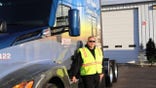 Jeremy Bellinger is pictured above with the truck transporting the U.S. Capitol Christmas tree (photo credit: System Transport)