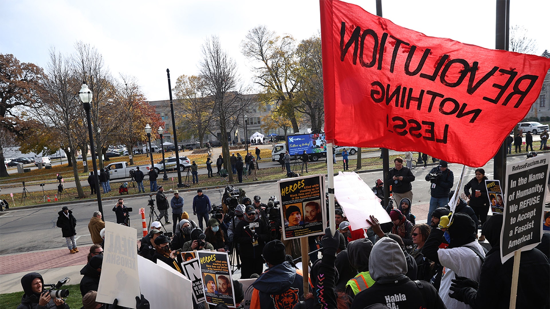 KENOSHA, WISCONSIN - NOVEMBER 16: BLM protesters and Kyle Rittenhouse supporters are confronted outside of the Kenosha County Courthouse on closing arguments in the Kyle Rittenhouse trial in Kenosha, Wisconsin, United States on November 16, 2021. (Photo by Tayfun Coskun/Anadolu Agency via Getty Images)