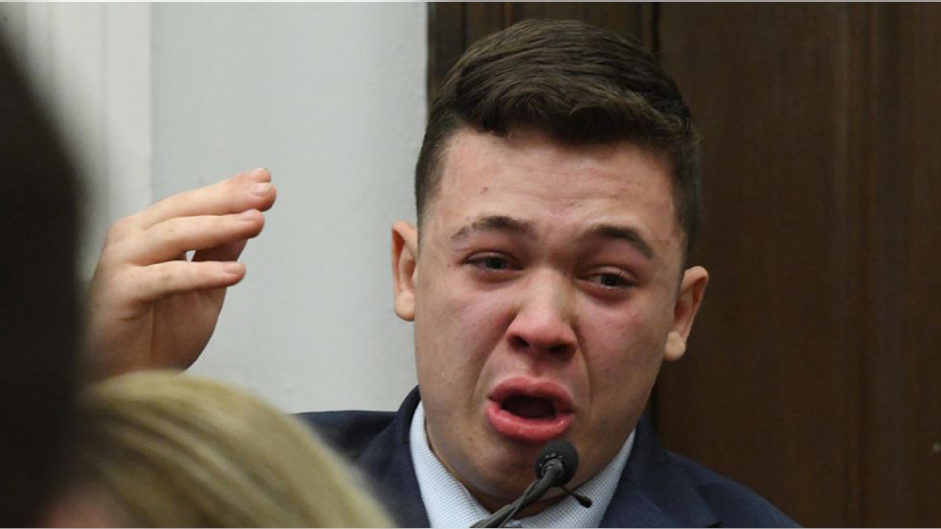 KENOSHA, WISCONSIN - NOVEMBER 10: Kyle Rittenhouse becomes emotional describing events leading up to the shooting of Joseph Rosenbaum as he testifies during his trial at the Kenosha County Courthouse on November 10, 2021 in Kenosha, Wisconsin. Rittenhouse shot three demonstrators, killing two of them, during a night of unrest that erupted in Kenosha after a police officer shot Jacob Blake seven times in the back while police attempted to arrest him in August 2020. Rittenhouse, from Antioch, Illinois, was 17 at the time of the shooting and armed with an assault rifle. He faces counts of felony homicide and felony attempted homicide. (Photo by Mark Hertzberg-Pool/Getty Images)