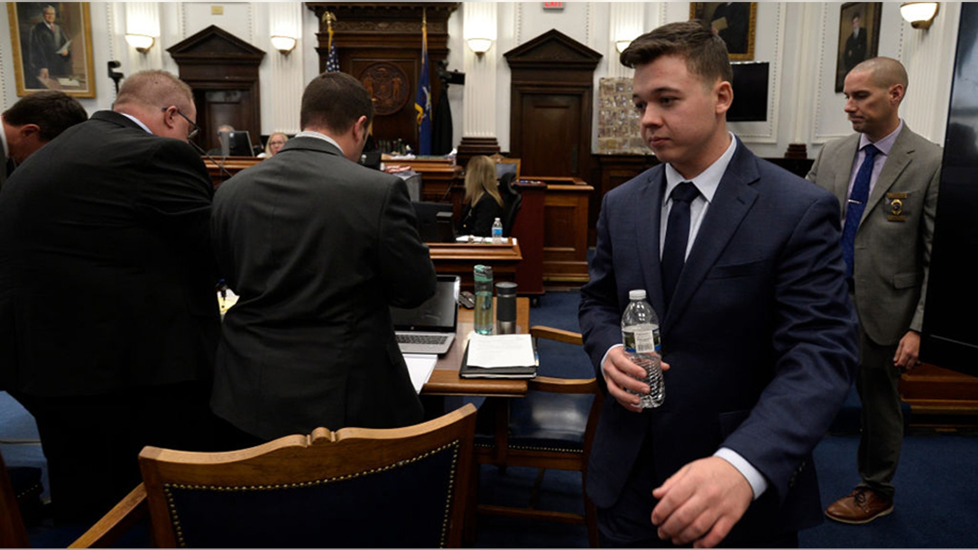 KENOSHA, WISCONSIN - NOVEMBER 10: Kyle Rittenhouse walks away from the witness stand for a break during his trial at the Kenosha County Courthouse on November 10, 2021 in Kenosha, Wisconsin. Rittenhouse is accused of shooting three demonstrators, killing two of them, during a night of unrest that erupted in Kenosha after a police officer shot Jacob Blake seven times in the back while being arrested in August 2020. Rittenhouse, from Antioch, Illinois, was 17 at the time of the shooting and armed with an assault rifle. He faces counts of felony homicide and felony attempted homicide. (Photo by Sean Krajacic-Pool/Getty Images)