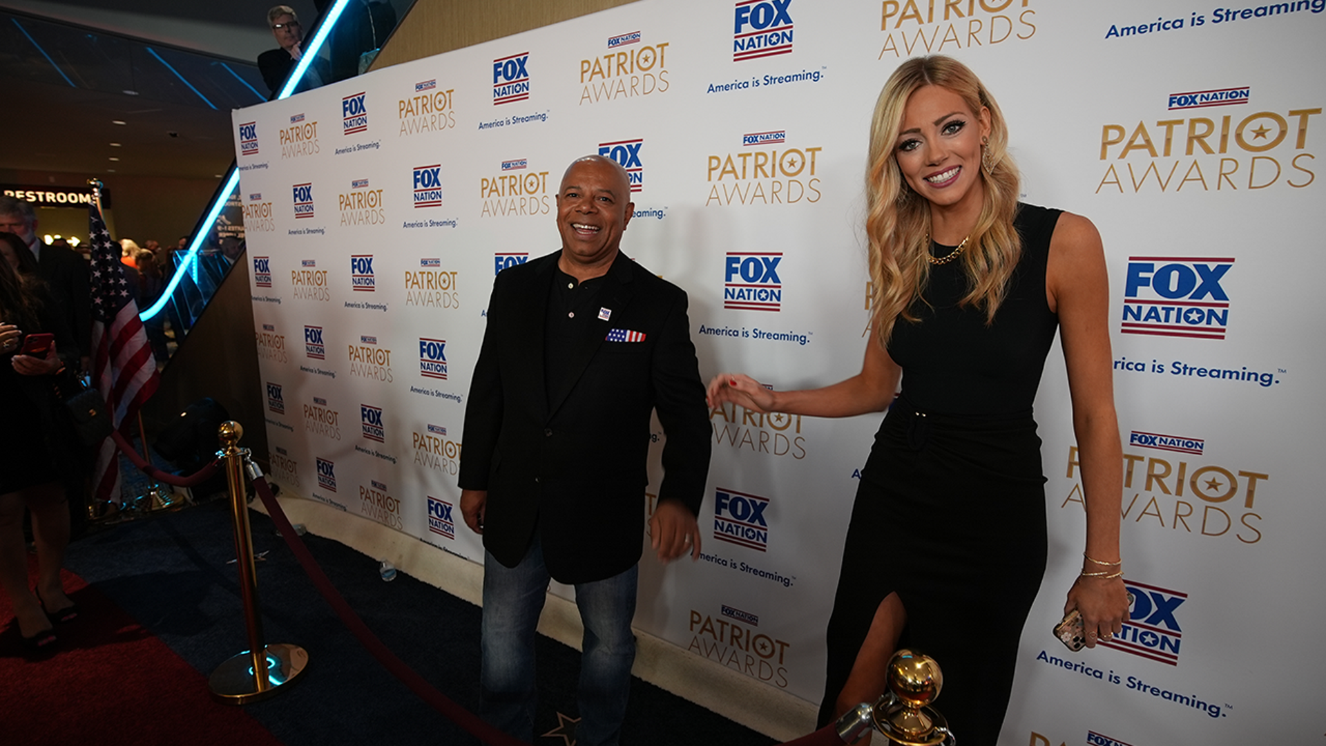 Abby Hornacek and David Webb stop for a photo at the Patriot Awards