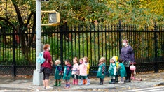 NYC school kids eat lunch outside despite dropping temps in order to social distance