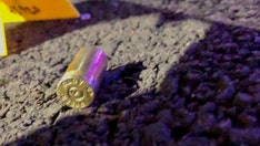 Portland police searching for two suspects who fired multiple rounds at officers, striking cruiser