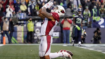 McCoy leads Cardinals to decisive 23-13 win over Seahawks