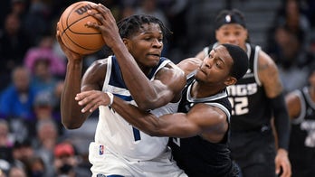 Edwards closes out Timberwolves' 107-97 win against Kings