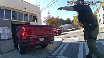 Watch: Armed Atlanta teens crash truck into vacant building after shooting at officers
