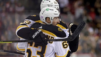 Marchand scores twice, Bruins end Devils 3-game win streak