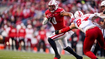 Allen carries No. 19 Wisconsin to 35-28 win over Nebraska