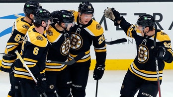 Brad Marchand, Linus Ullmark carry Bruins past Canucks 3-2
