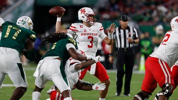 Tune passes for 385 yards, No. 20 Houston tops USF 54-42