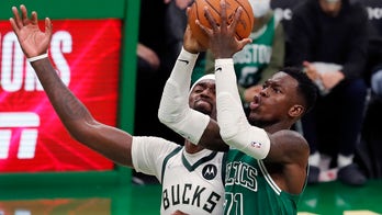 With Giannis scratched, Celtics beat Bucks 122-113 in OT