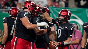 Ridder breaks Cincinnati TD record, No. 2 Bearcats beat USF