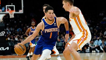 Booker, Suns rally in 4th quarter for 121-117 win over Hawks