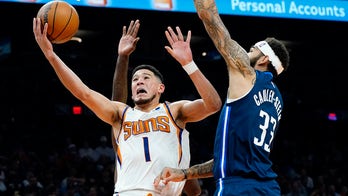 Booker scores 24 points, Suns beat Mavs for 10th straight