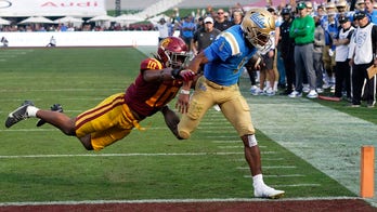 Thompson-Robinson leads UCLA past USC 62-33