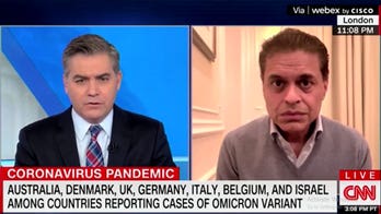 CNN host calls for global vaccine passports to prove which brand, dosage each person has received