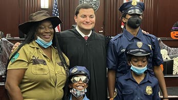 15 kids adopted into forever homes in Halloween-themed ceremony