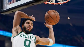Tatum scores 23, Celtics beat Cavaliers 98-92 to split set