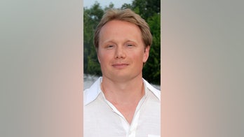 Purdue professor specializing in 'happiness' allegedly locked son in dog crate, beat wife