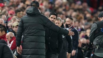Liverpool, Arsenal managers held back in heated moment during match
