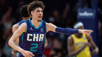 Ball scores 32 points, Hornets hold off Pacers 121-118