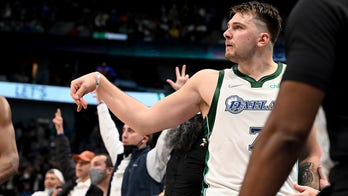 Doncic's buzzer-beating 3 lifts Mavs over Celtics 107-104