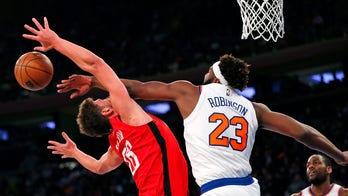 Burks has big fourth, Knicks hand Rockets 14th straight loss