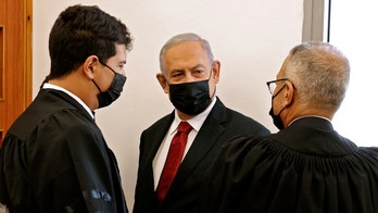 Netanyahu appears in court as confidant prepares to testify against him