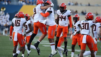 Sanders throws 2 TDs passes, No. 11 Oklahoma State tops WVU